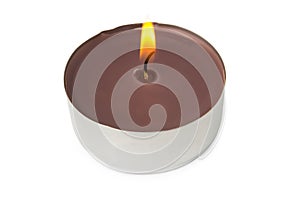 Burning scented pillar candle