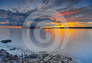 Burning sky in sunrise at dangas beach Batam Island