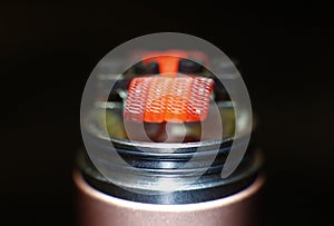 Burning staple staggered fused clapton coil in rebuildable dripping atomizer