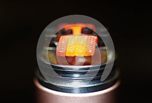 Burning staple staggered fused clapton coil in rebuildable dripping atomizer