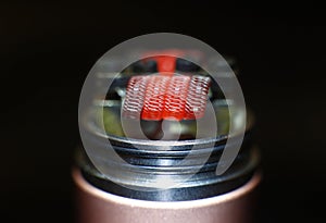 Burning staple staggered fused clapton coil in rebuildable dripping atomizer