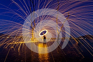 Burning Steel Wool spinning at sunset