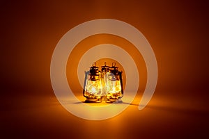 Burning three kerosene lamps background