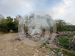 Burning trash in landfills