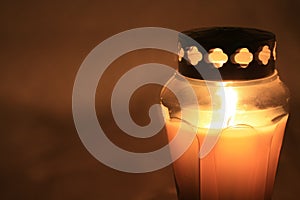 Burning votive light