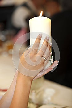 Burning wedding candle photo