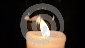 Burning white candle. Video. Background
