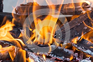 Burning wood in a brazier