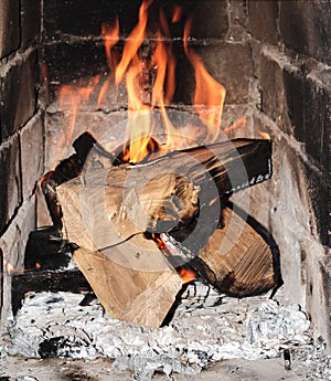 Burning wood in the fireplace