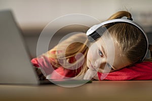 Burnout In Children. Upset Little Girl Looking At Laptop Screen