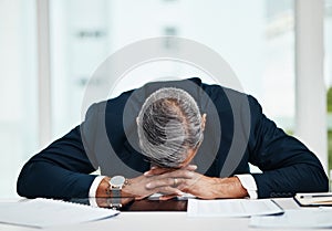 Burnout, professional and senior man sleeping at desk with tech or problem with fatigue in office. Tired, stress and