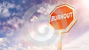 Burnout, text on red traffic sign