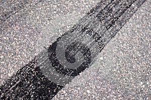 Burnout tire marks on asphalt..