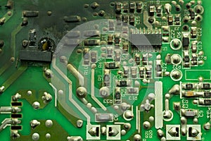 Burnt electronics board, with black soot