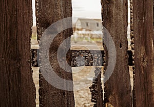 Burnt fence boards after a fire in a private house