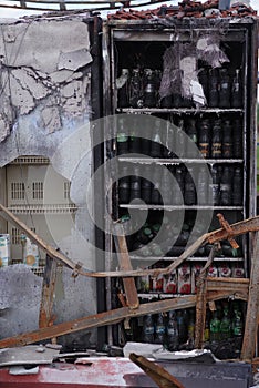 Burnt goods in refrigerators in a store after a fire