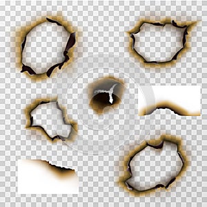 Burnt hole in paper or pergament, scorched papers vector set photo