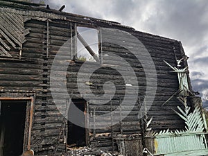 Burnt house outdoor. Fire Damage
