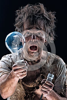 Burnt man with light bulb