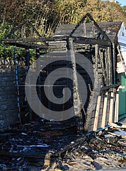 Burnt out beach hut caused by vandalism at bournemouth