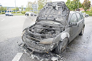 Burnt Out Car On Wath Road Roundabout A6195 Dearne Valley Parkway, Wombwell, Barnsley, South Yorkshire 2pm 9th September 2018