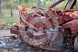 Burnt Out Engine Of A Rusted Car Wreck