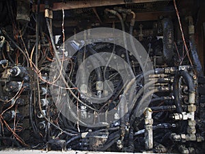 Burnt out hydraulic room in a excavator.