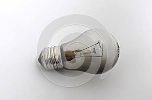Burnt out light bulb on a white background