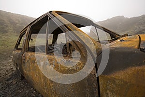 Burnt out and rusted car