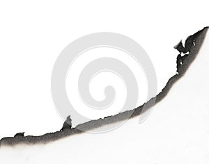 Burnt paper edge isolated on white background. burns borders paper close up