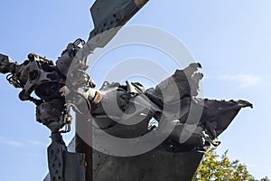 Burnt parts of the destroyed Russian Air Force combat helicopter Hind Crocodile. The wreckage of a downed helicopter. War in