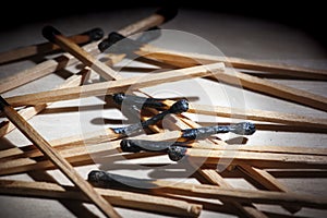 Burnt piles of matches