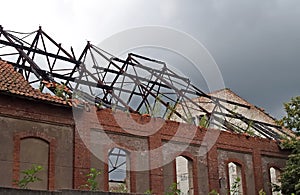 A burnt roof on a German-built building. Chernyakhovsk, Kaliningrad region