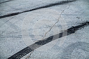 Burnt rubber traces on asphalt