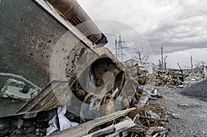 Burnt tank and destroyed buildings of the Azovstal plant shop in Mariupol