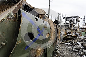Burnt tank and destroyed buildings of the Azovstal plant shop in Mariupol