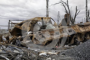 Burnt tank and destroyed buildings of the Azovstal plant shop in Mariupol