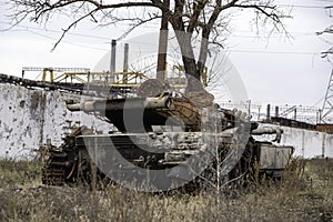 Burnt tank and destroyed buildings of the Azovstal plant shop in Mariupol