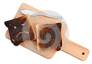Burnt toast bread isolated white background with clipping path.