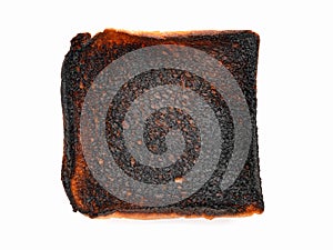 Burnt toast bread slice isolated on white background