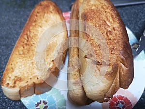 burnt toast on plate food background