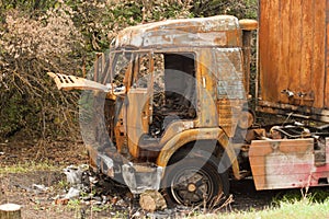 Burnt truck on the side of the road