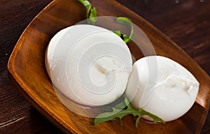 Burrata cheese and rukkola leaf closeup