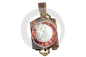 Burrata Italian cheese made from cream and milk of buffalo or cow. Isolated, white background.