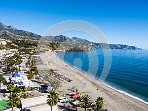 Burriana beach in the Spanish Town of Nerja in Andalucia photo