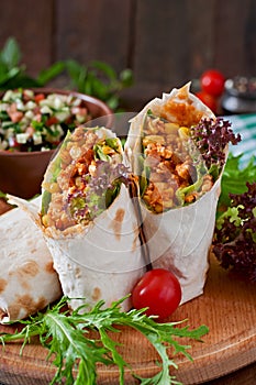 Burritos wraps with minced beef and vegetables