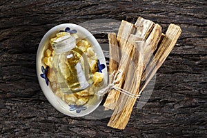 Bursera graveolens, essence and resin. in Spanish `palo santo`