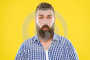 Burst of laughter. Hipster with beard and mustache emotional surprised expression. Rustic surprised macho. Man bearded