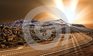 Bursting sunset over a mountain desert landscape