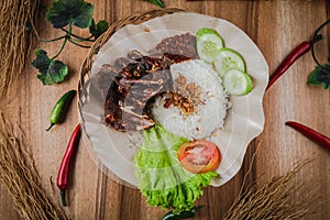 Burung Dara Goreng or fried pigeons are a traditional Indonesian food